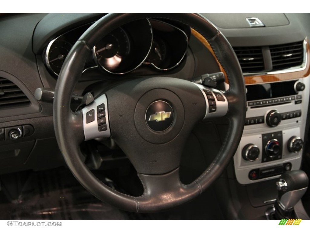 2009 Chevrolet Malibu LT Sedan Ebony Steering Wheel Photo #84863564