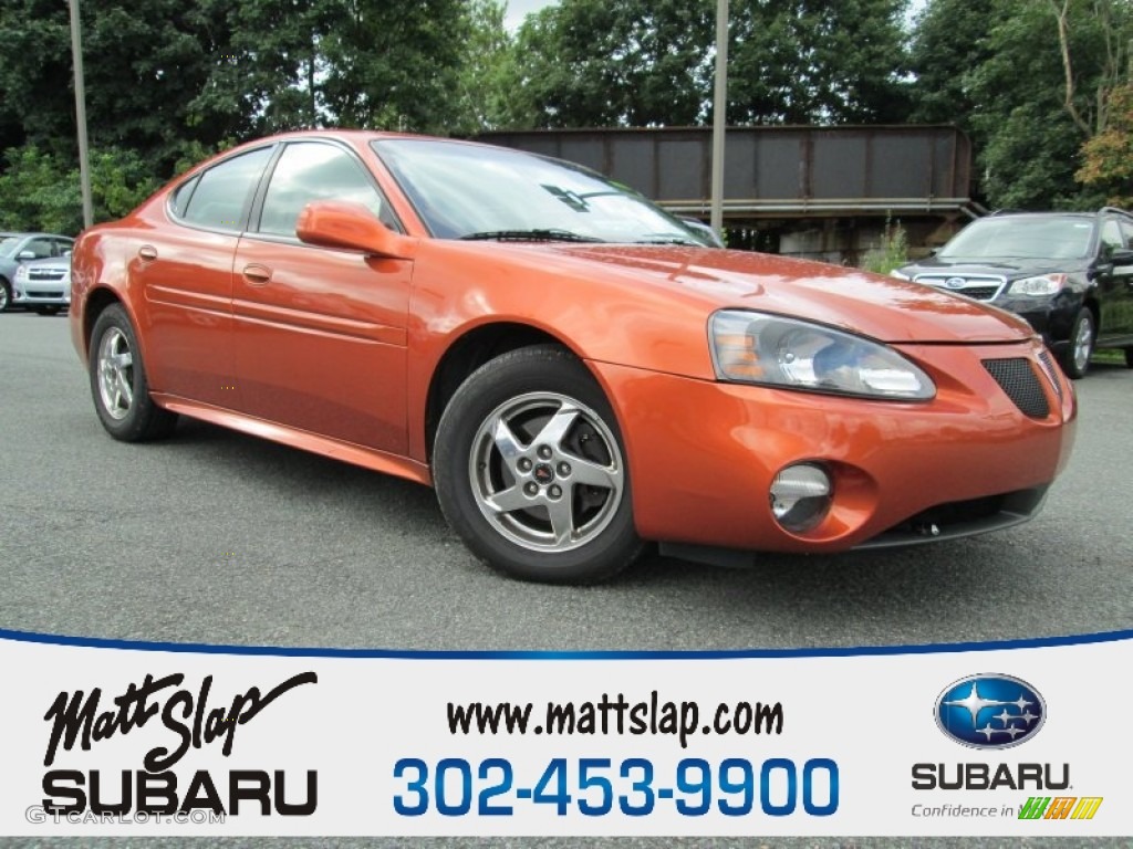 2004 Grand Prix GT Sedan - Fusion Orange Metallic / Dark Pewter photo #1