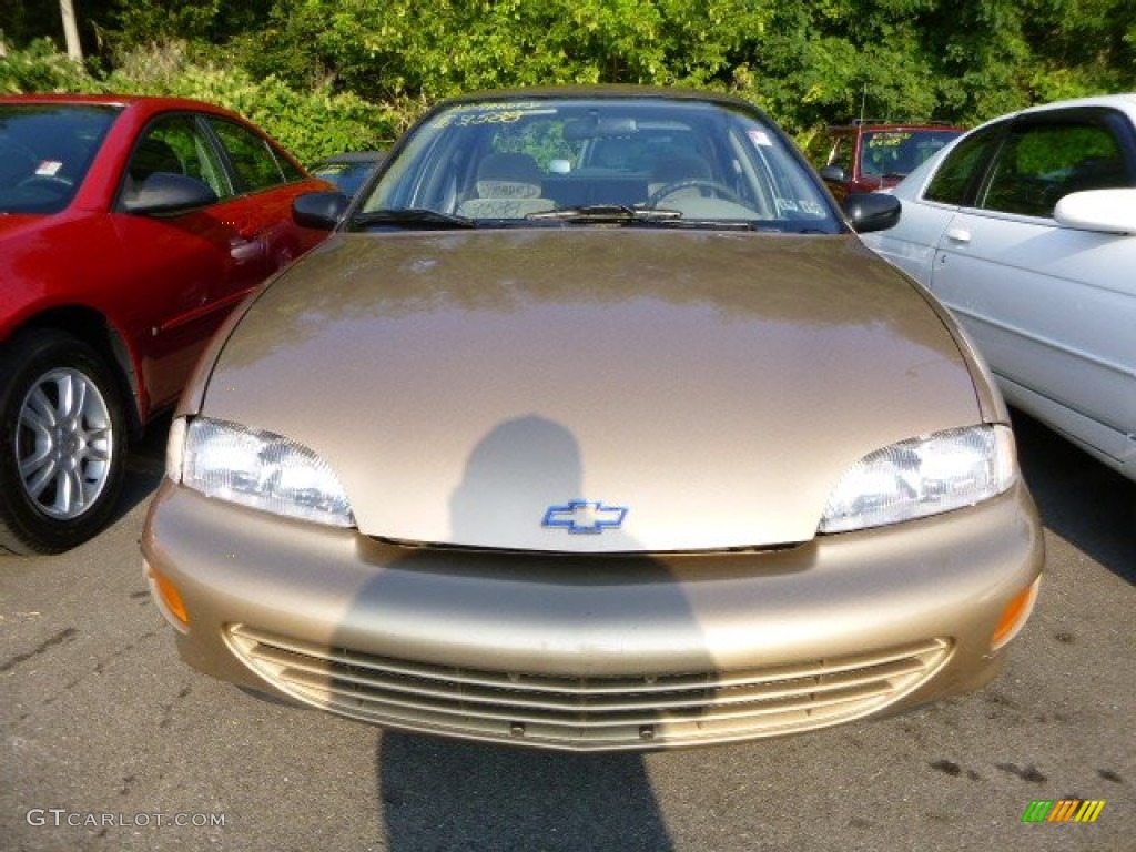 1999 Cavalier LS Sedan - Medium Sunset Gold Metallic / Neutral photo #6