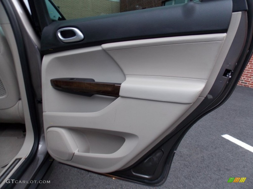 2011 Saab 9-4X 3.0i XWD Parchment Door Panel Photo #85010534