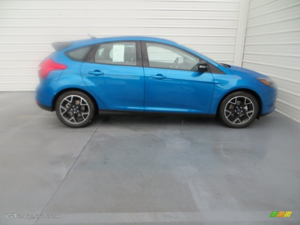 Blue Candy 2014 Ford Focus SE Hatchback Exterior Photo #85013027