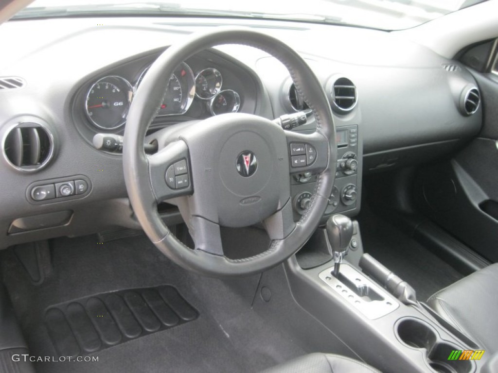 2005 Pontiac G6 GT Sedan Ebony Dashboard Photo #85020566