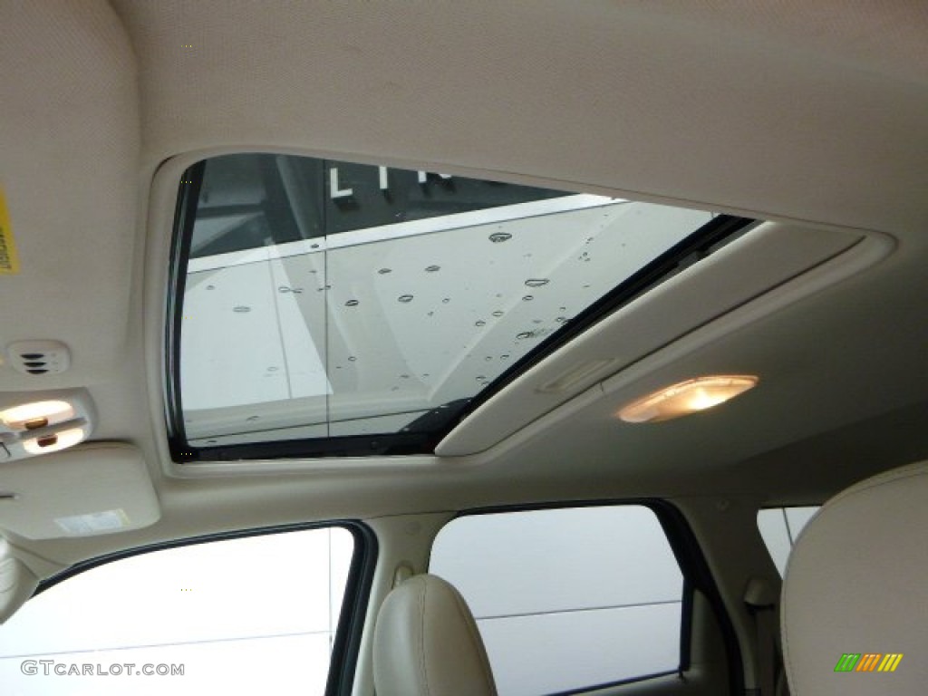 2010 Mariner V6 Premier 4WD - Sangria Red Metallic / Stone photo #21