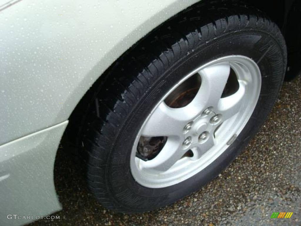 2005 Taurus SE - Gold Ash Metallic / Medium/Dark Pebble photo #9