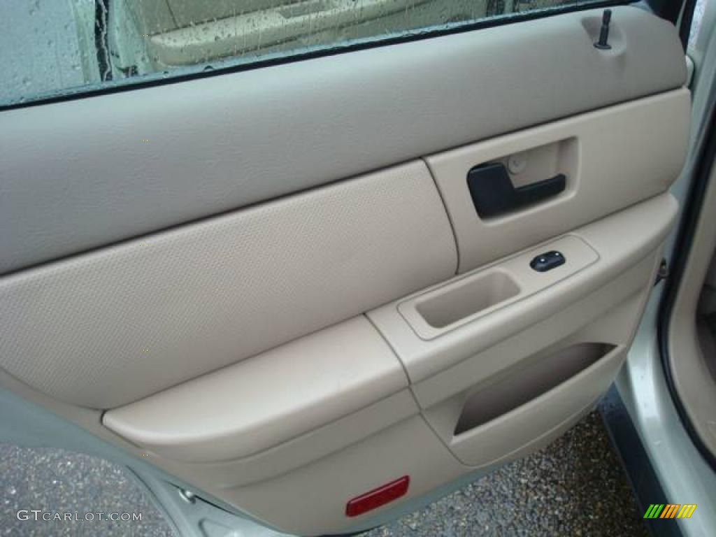 2005 Taurus SE - Gold Ash Metallic / Medium/Dark Pebble photo #13