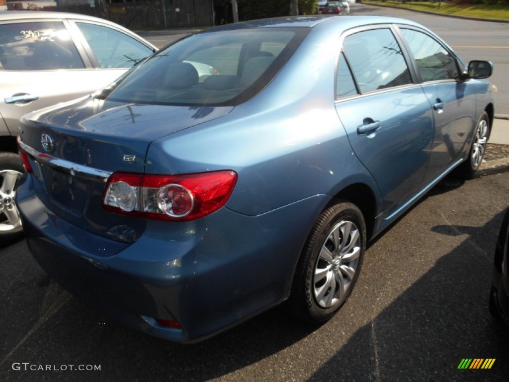 Tropical Sea Metallic 2013 Toyota Corolla LE Exterior Photo #85089365