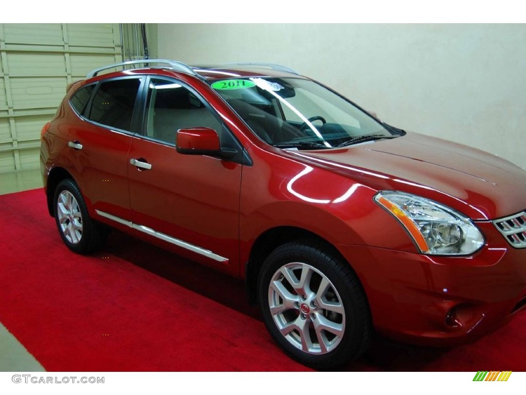 2011 Rogue SV - Cayenne Red / Black photo #1