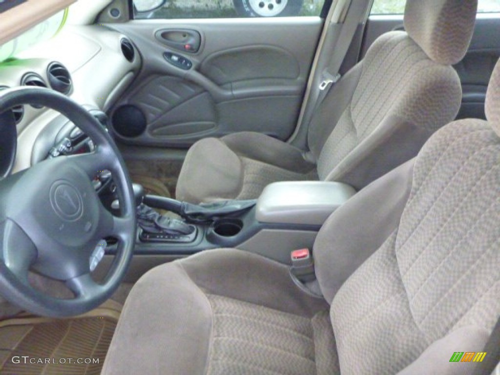 2002 Grand Am SE Sedan - Champagne Beige Metallic / Dark Taupe photo #10