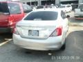 2012 Brilliant Silver Metallic Nissan Versa 1.6 SL Sedan  photo #3