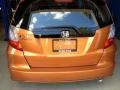 2010 Orange Revolution Metallic Honda Fit Sport  photo #2