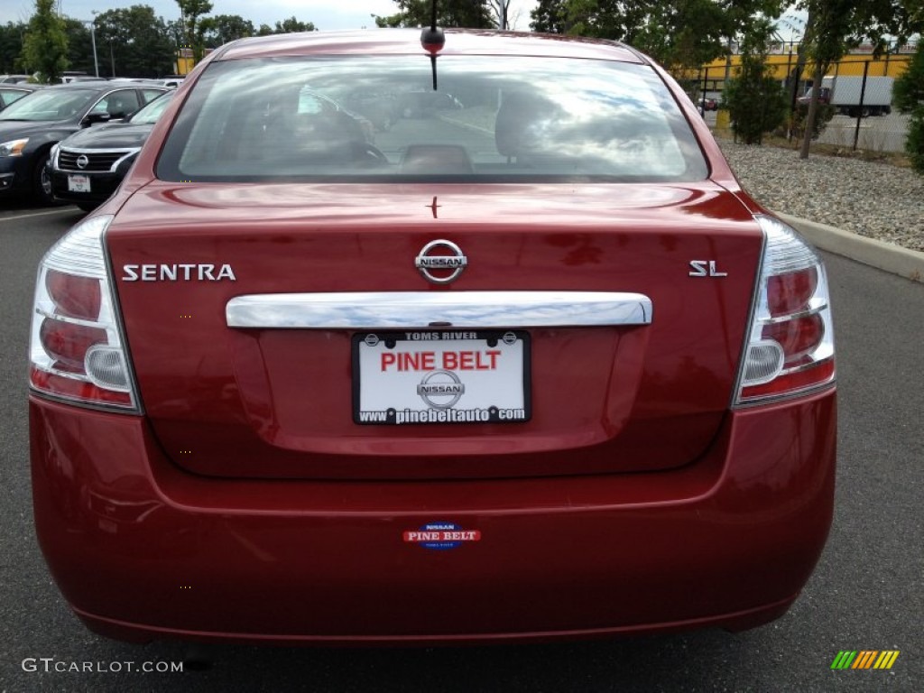 2010 Sentra 2.0 SL - Red Brick Metallic / Charcoal photo #6