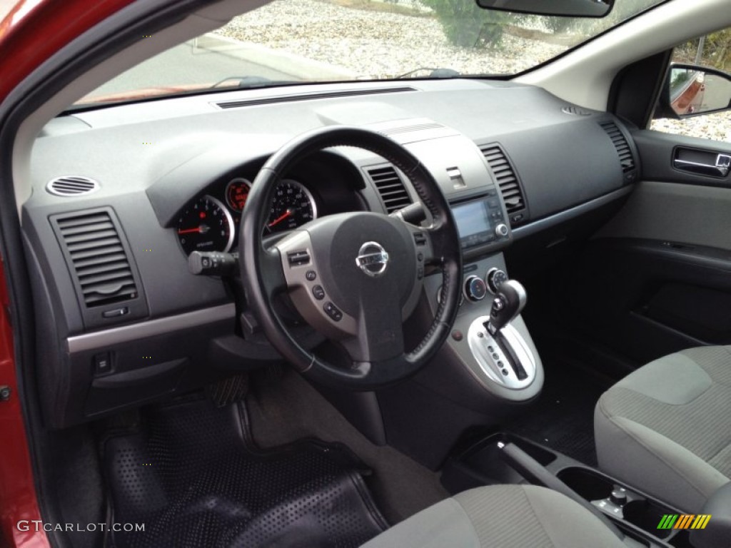 2010 Sentra 2.0 SL - Red Brick Metallic / Charcoal photo #9