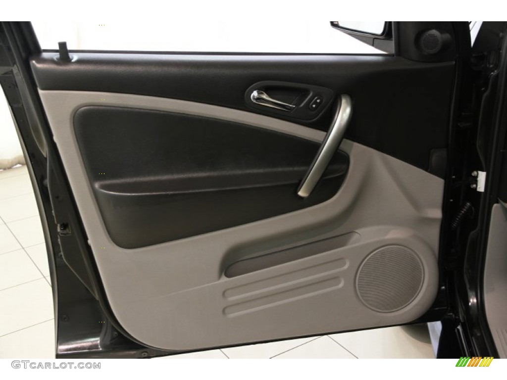 2006 Saturn VUE V6 AWD Ebony Door Panel Photo #85423233