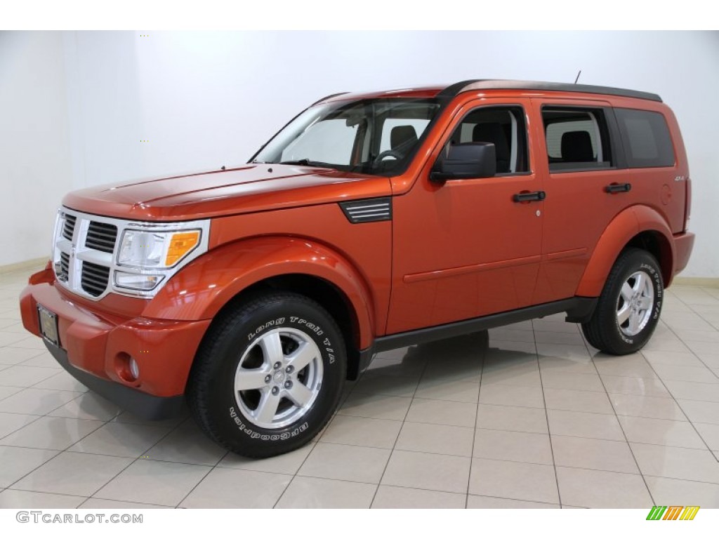 2009 Nitro SE 4x4 - Sunburst Orange Pearl / Dark Slate Gray photo #3