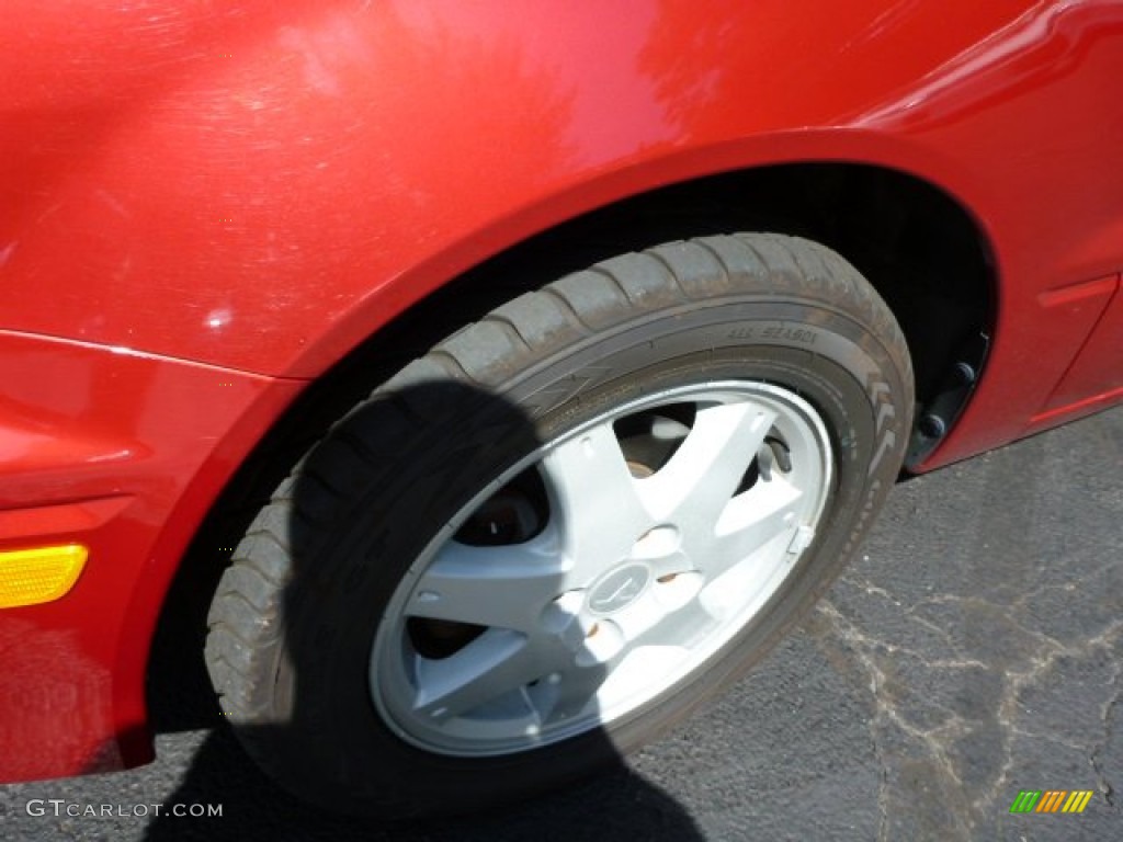 2002 Lancer LS - Rio Red Pearl / Tan photo #8