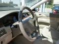 2002 Mitsubishi Lancer Tan Interior Steering Wheel Photo