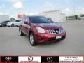2011 Cayenne Red Nissan Rogue SV  photo #1