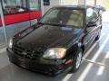 2003 Ebony Black Hyundai Accent GL Coupe  photo #2