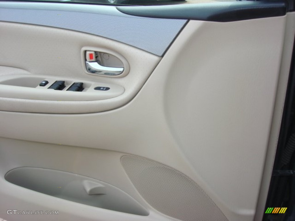 2004 MPV ES - Nordic Green Mica / Beige photo #17
