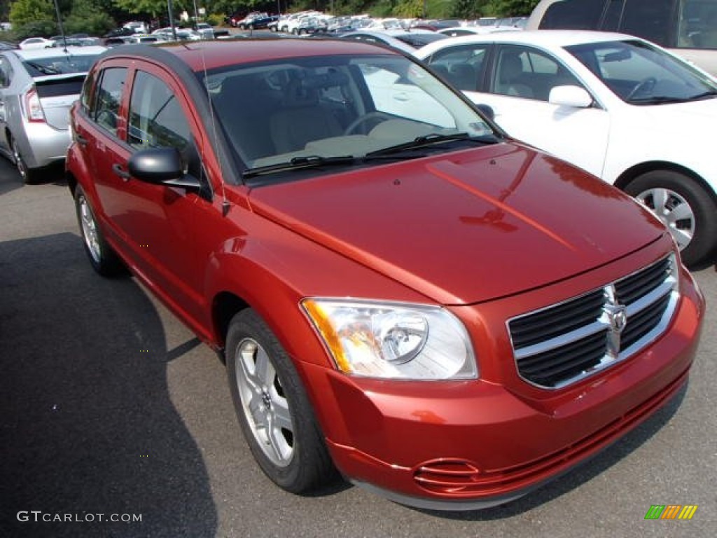 2011 Caliber Mainstreet - Inferno Red Crystal Pearl / Dark Slate Gray photo #1