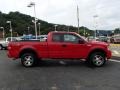 2005 Bright Red Ford F150 XLT SuperCab 4x4  photo #1