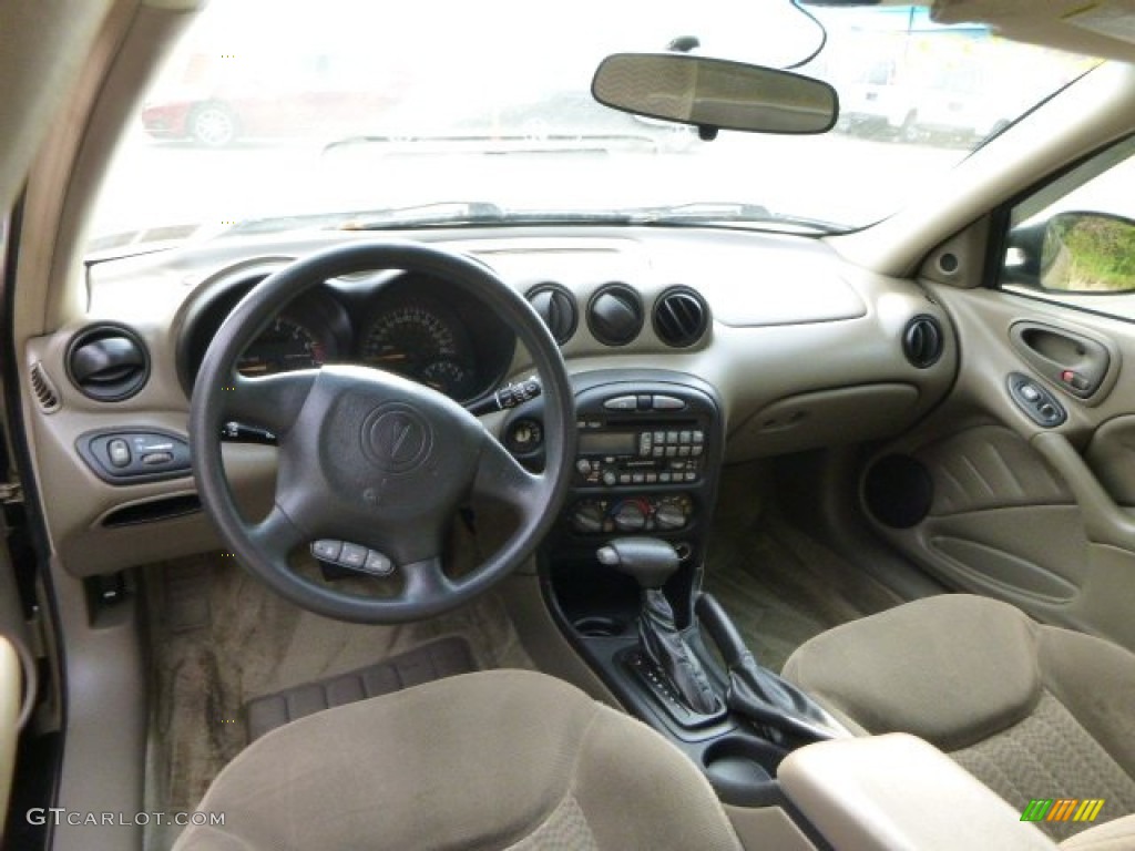 2001 Grand Am SE Sedan - Champagne Beige Metallic / Dark Taupe photo #10