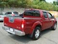 2007 Red Brawn Nissan Frontier LE Crew Cab 4x4  photo #2
