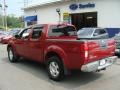 2007 Red Brawn Nissan Frontier LE Crew Cab 4x4  photo #4