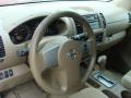 2007 Red Brawn Nissan Frontier LE Crew Cab 4x4  photo #7