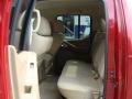 2007 Red Brawn Nissan Frontier LE Crew Cab 4x4  photo #16