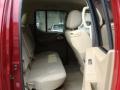 2007 Red Brawn Nissan Frontier LE Crew Cab 4x4  photo #19