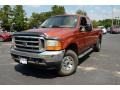 2001 Bright Amber Metallic Ford F350 Super Duty XLT SuperCab 4x4 #85642865