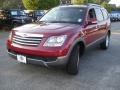 2009 Spicy Red Kia Borrego LX V6 4x4  photo #1