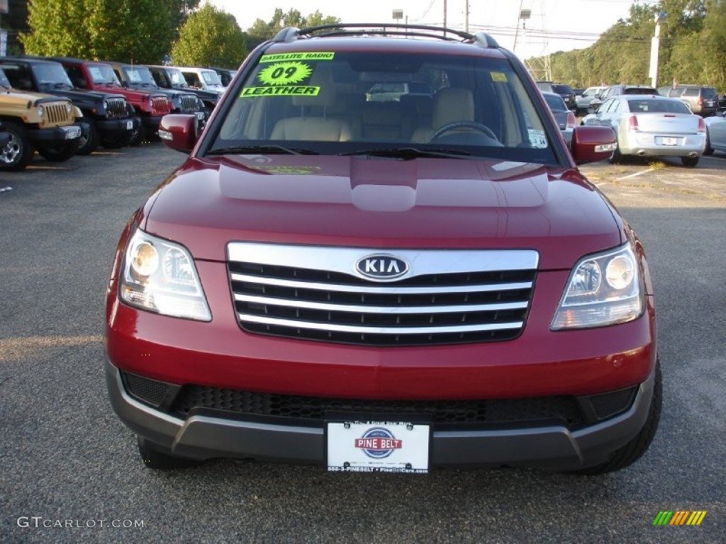 2009 Borrego LX V6 4x4 - Spicy Red / Beige photo #2