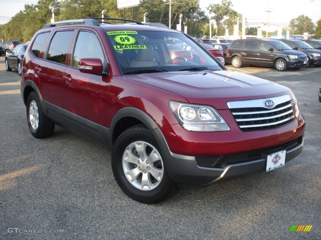 2009 Borrego LX V6 4x4 - Spicy Red / Beige photo #3