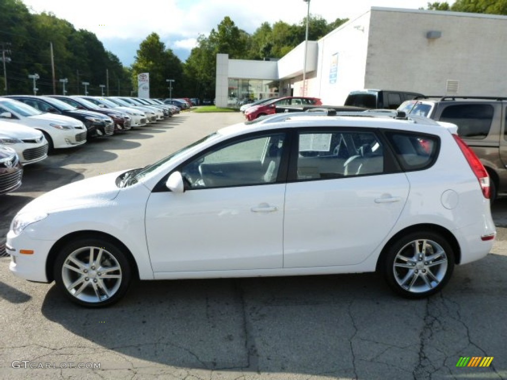 2012 Elantra SE Touring - Monaco White / Black photo #6