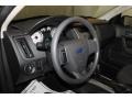 2009 Ebony Black Ford Focus SE Sedan  photo #20