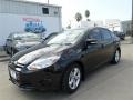 2014 Tuxedo Black Ford Focus SE Sedan  photo #1