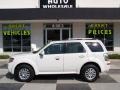 White Suede - Mariner V6 Premier 4WD Photo No. 1