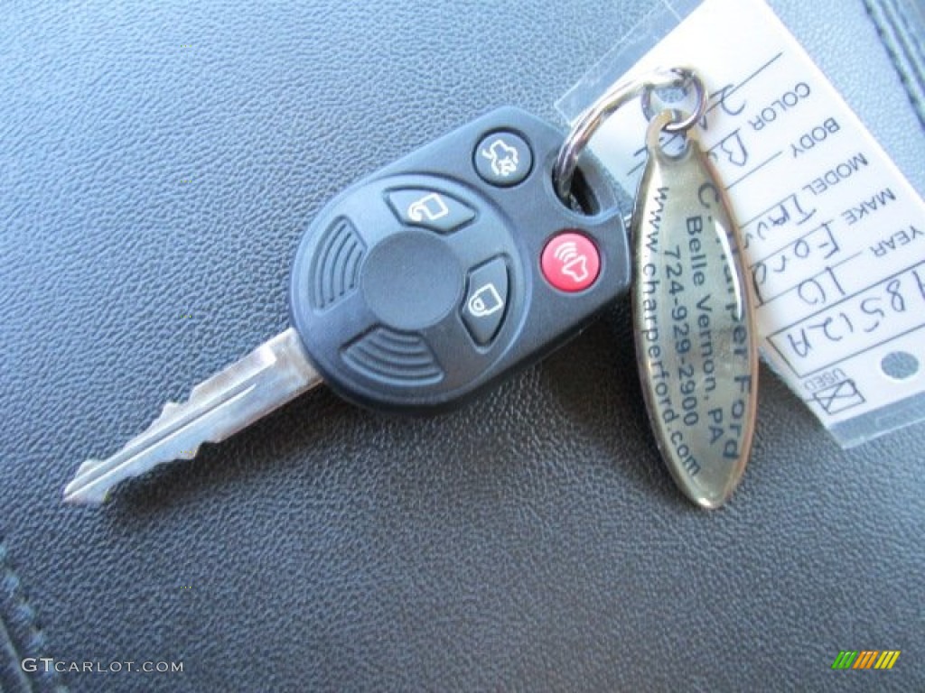 2010 Taurus Limited - Red Candy Metallic / Charcoal Black photo #22