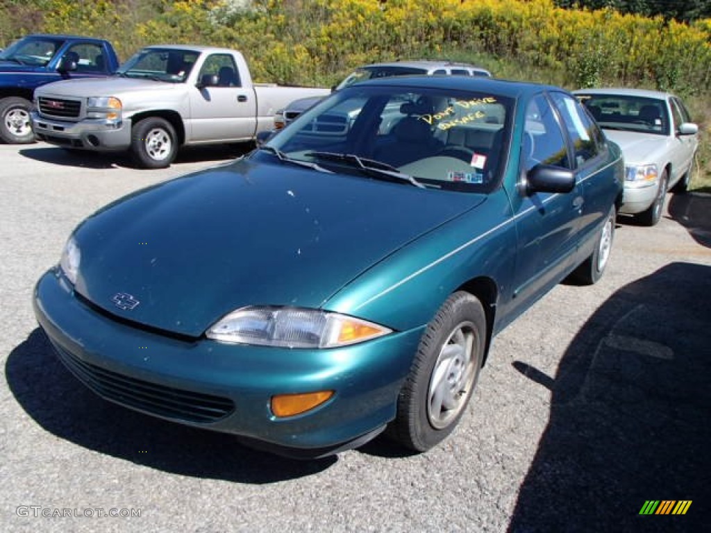 1998 Cavalier Sedan - Manta Green Metallic / Gray photo #1