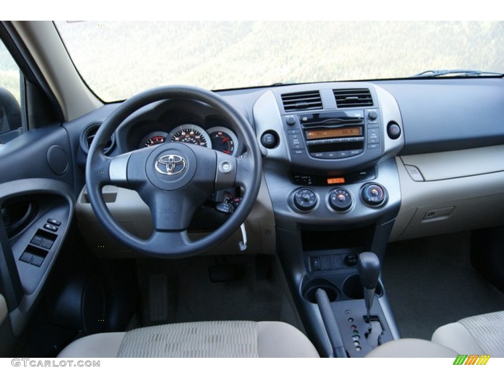 2010 RAV4 I4 4WD - Black Forest Pearl / Sand Beige photo #10