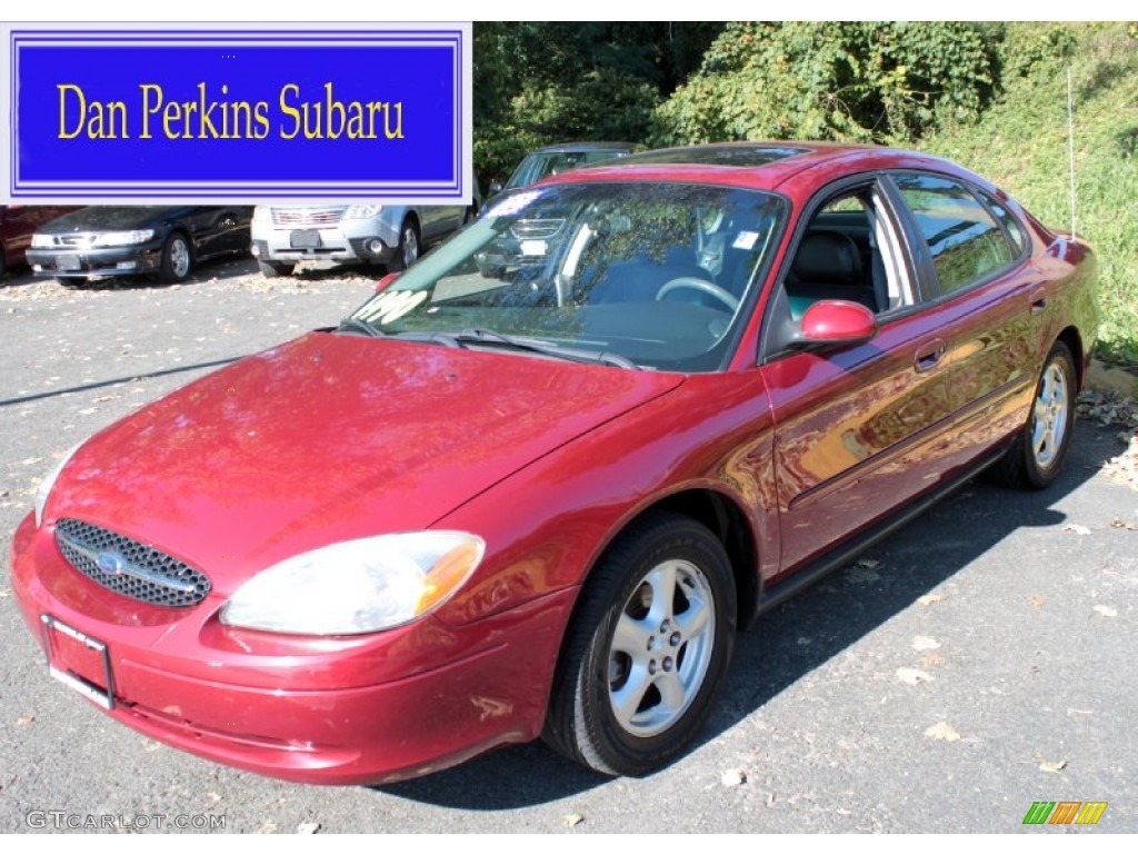 2002 Taurus SES - Matador Red Metallic / Medium Graphite photo #1