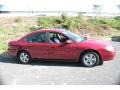 2002 Matador Red Metallic Ford Taurus SES  photo #4