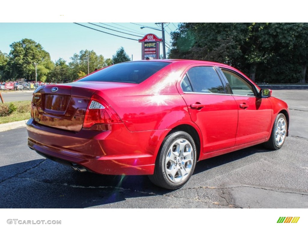 2010 Fusion SE - Red Candy Metallic / Medium Light Stone photo #6