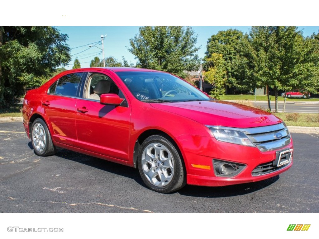 2010 Fusion SE - Red Candy Metallic / Medium Light Stone photo #8