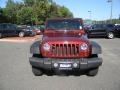 2010 Flame Red Jeep Wrangler Unlimited Mountain Edition 4x4  photo #2