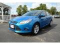 2014 Blue Candy Ford Focus SE Sedan  photo #1