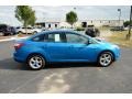 2014 Blue Candy Ford Focus SE Sedan  photo #4