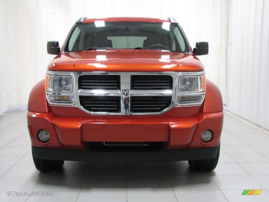 2009 Nitro SLT 4x4 - Sunburst Orange Pearl / Dark Khaki/Medium Khaki photo #2